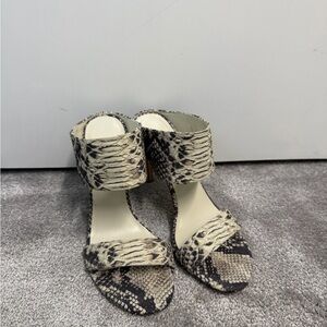 Stuart Weitzman Snakeskin Heels in Black and Cream
